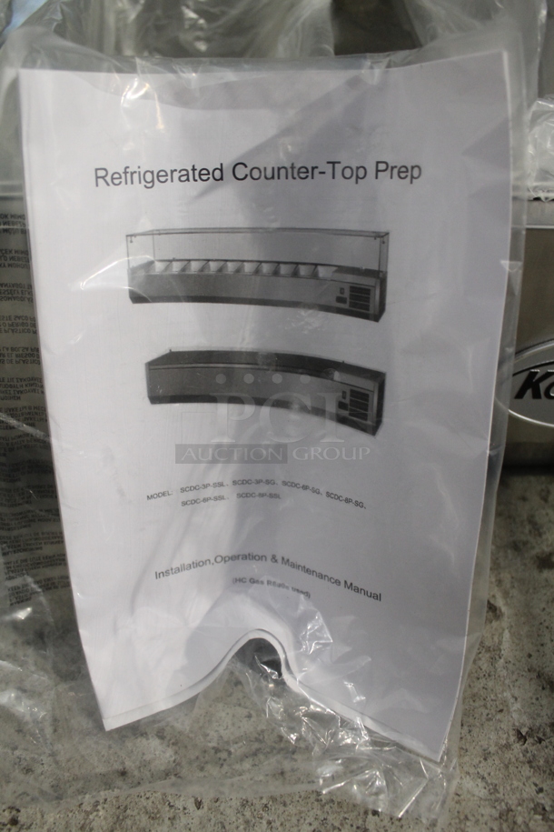 BRAND NEW SCRATCH AND DENT! KoolMore SCDC-3P-SSL Stainless Steel Commercial Countertop Refrigerated Rail w/ 3 Drop In Bins and Glass Sneeze Guard. 115 Volts, 1 Phase. Tested and Working!
 - Image 2 of 12