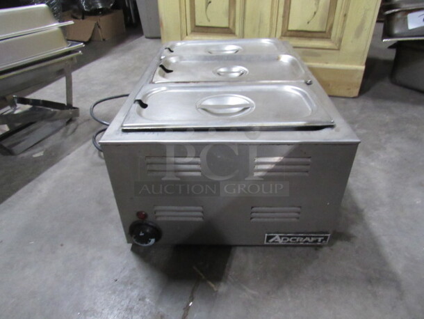 One Adcraft Food Warmer With 3-1/3 Size Hotel Pans With Lids. #FW1200WF. 120 Volt.