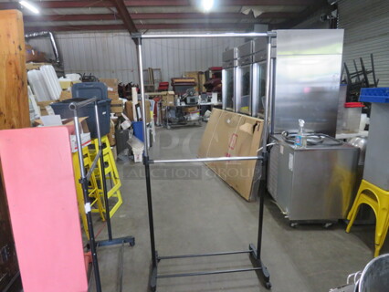 One Adjustable Garment Rack On Casters.