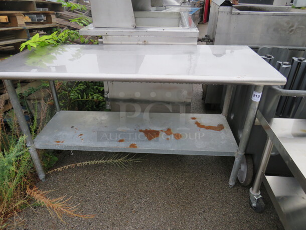 One Stainless Steel Table With Under Shelf. 60X24X33