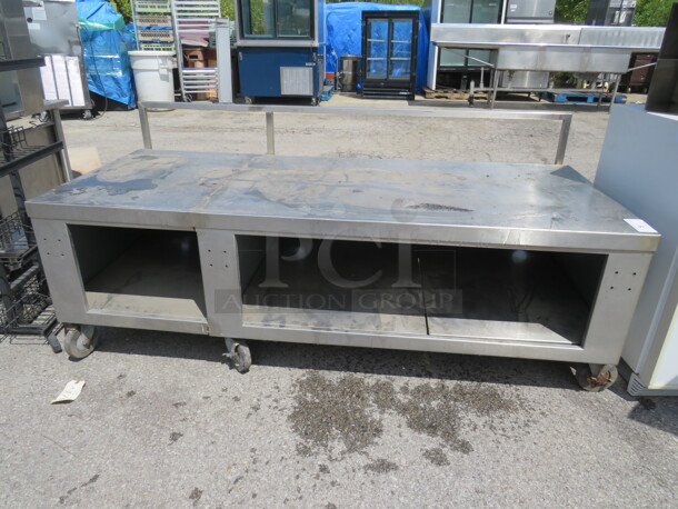 One Stainless Steel Equipment Table On Casters. 72.5X31X31.5