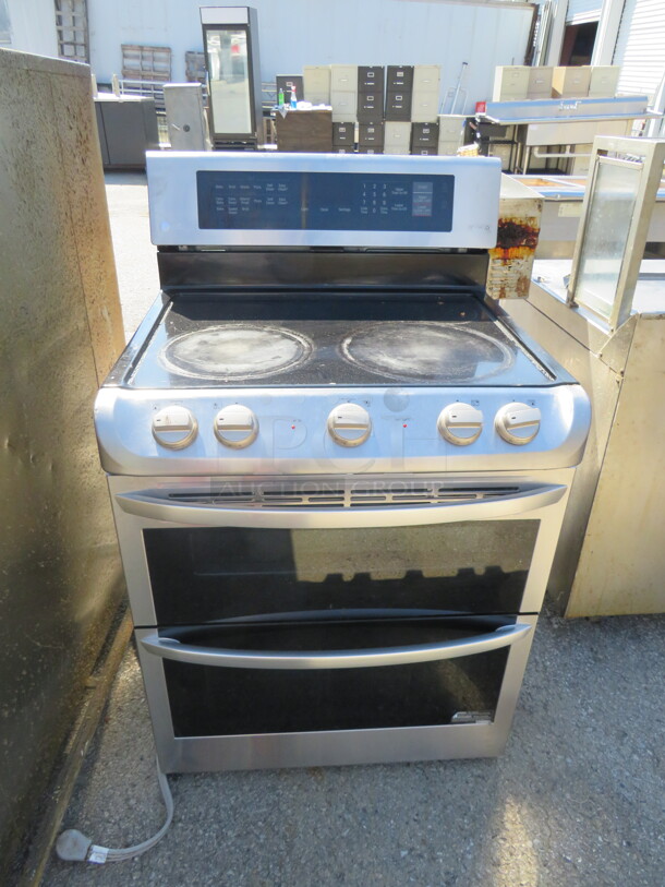 One LG Household Range With Dual Ovens, With 3 Racks. 30X27X48