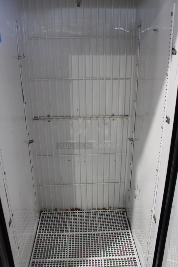 2013 True T-23F ENERGY STAR Stainless Steel Commercial Single Door Reach In Cooler w/ Poly Coated Racks on Commercial Casters. 115 Volts, 1 Phase. Tested and Working! - Image 2 of 6