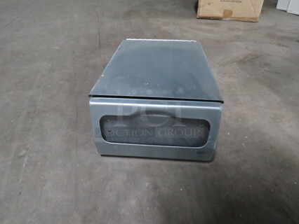 One Table Top Napkin Dispenser.