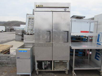 One Stainless Steel 2 Door TRUE Freezer With 7 Shelves On Casters. 115 Volt. Model#T-35F. 39.5X29.5X84. Missing Bottom Panel.
