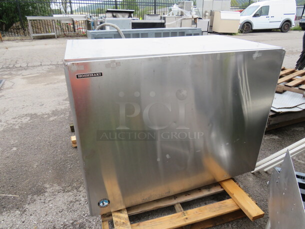 One Hoshizaki Ice Maker And Remote. Model# KM-2500SRH3.208-230 Volt. 3 Phase. 48X28X37. Remote 46.5X14.5X41.  - Image 1 of 4