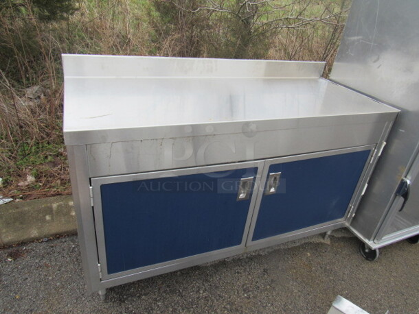 One Stainless Steel 2 Door Cabinet With 2 SS Under Shelves. 60X25X40
