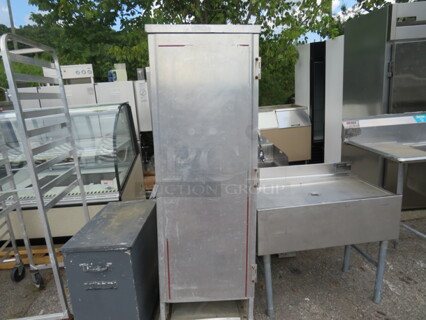 One 1 Door Aluminum Holding Cabinet On Casters. 21X30X67.5