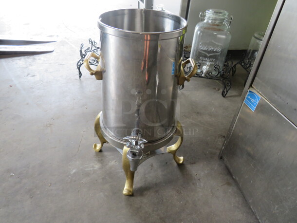 One Stainless Steel Beverage Dispenser With Gold Trim And Stainless Stee/Gold Trim  Stand. - Image 1 of 2