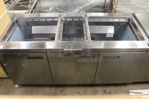 2012 Delfield 4472N-30M-M334 Stainless Steel Commercial Prep Table on Commercial Casters. Missing Lids. 115 Volts, 1 Phase. Tested and Powers On But Does Not Get Cold