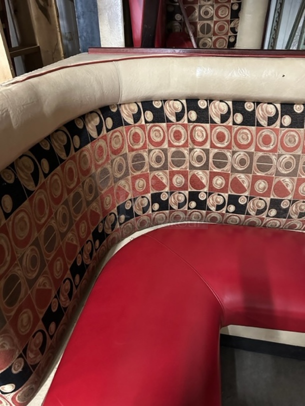 One VIP Booth With Red Cushioned Seat And Multi Color Cushioned Back.  - Image 1 of 1