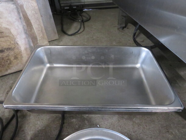 One Full Size 4 Inch Deep Hotel Pan. - Image 1 of 1