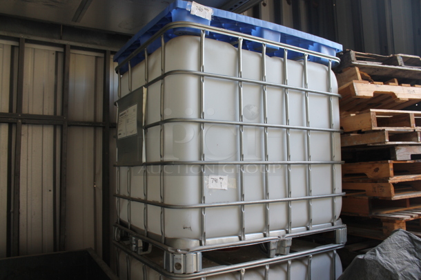 White Poly Tank in Metal Cage. BUYER MUST REMOVE. - Image 2 of 4