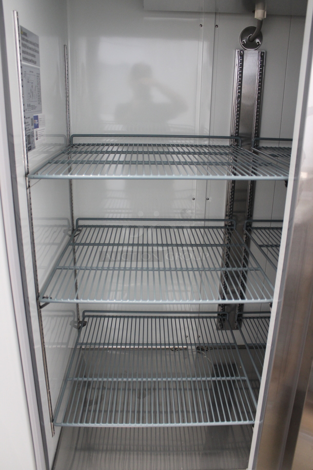 BRAND NEW SCRATCH AND DENT! 2022 Avantco 178A49RHC Stainless Steel Commercial 2 Door Reach In Cooler w/ Poly Coated Racks on Commercial Casters. 115 Volts, 1 Phase. Tested and Does Not Power On - Image 3 of 6