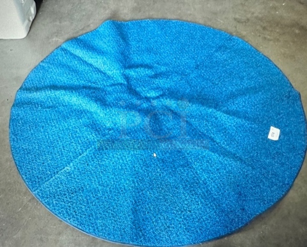 One 70 Inch Round Rug. - Image 1 of 1