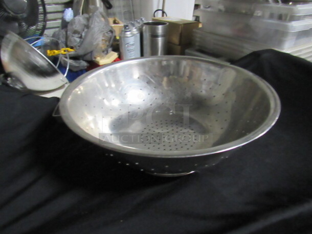 One 13 Inch Stainless Steel Colander.