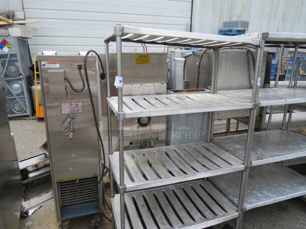 One Metal Shelving System With 4 Shelves. 36X20X63