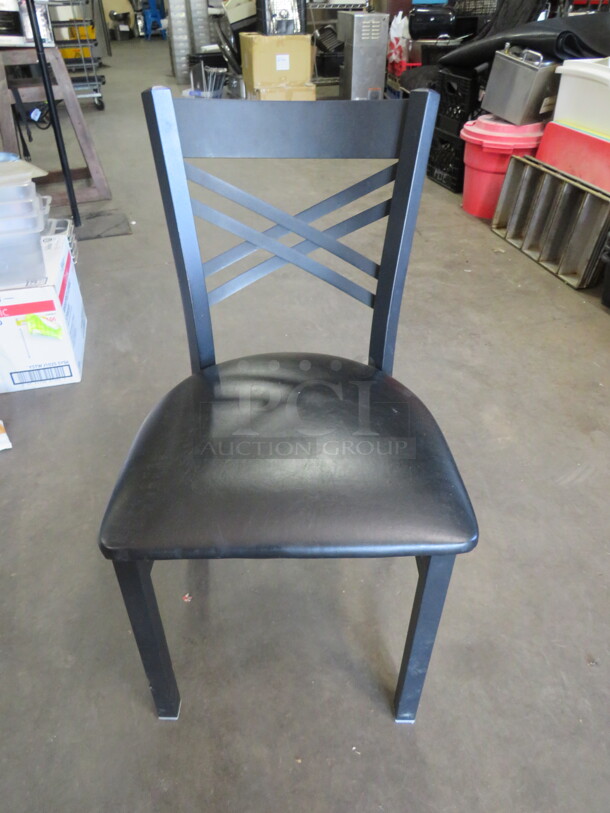 Black Metal Chair With A Black Cushioned Seat. 2XBID. LOOK NEW! - Item #1110119