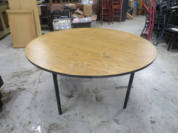 One Round Folding Table With Laminate Top And Metal Folding Legs. 60X60X29