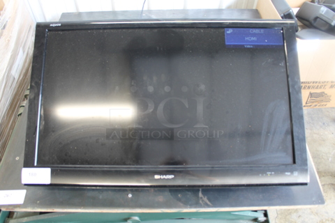 Sharp LC-40E77UN 40" Television. 120 Volts, 1 Phase. Tested and Working! Buyer Must Pick Up - We Will Not Ship This Item