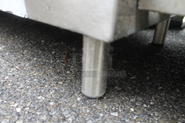 BRAND NEW SCRATCH AND DENT! Stainless Steel Commercial Table w/ 2 Under Shelves. - Image 4 of 4