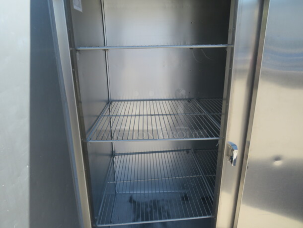 One 3 Door Stainless Steel Traulsen Refrigerator With 9 Racks On Casters. 115 Volt. Model# G30011. 76X35X83. $9727.00.  - Image 3 of 3