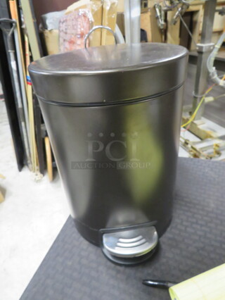 One Step Trash Can.