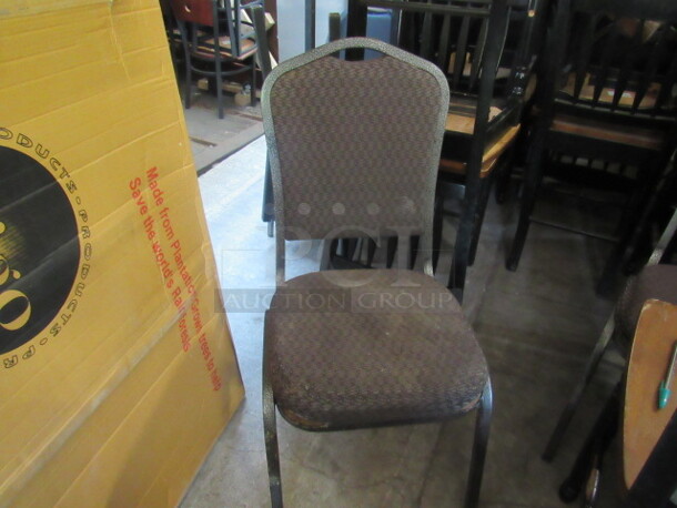Metal Stack Chair With Cushioned Seat And Back. 8XBID.