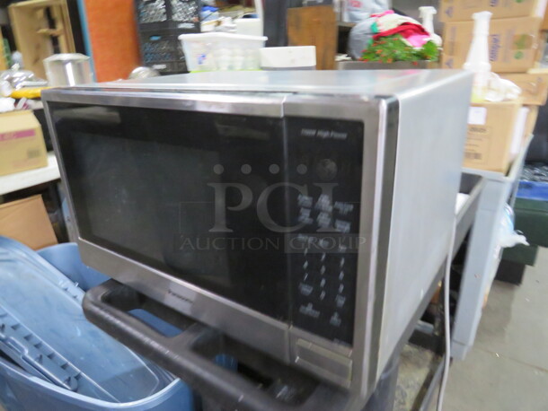 One Stainless Steel Panasonic Microwave. 1100 Watt. Model# NNSB646S. 20X16X12. $209.99. - Image 2 of 2