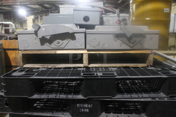 ALL ONE MONEY! Lot of Various Pallets; Black Poly and 1 Wooden w/ Gray Square D Metal Control Boxes. BUYER MUST REMOVE. - Image 2 of 4