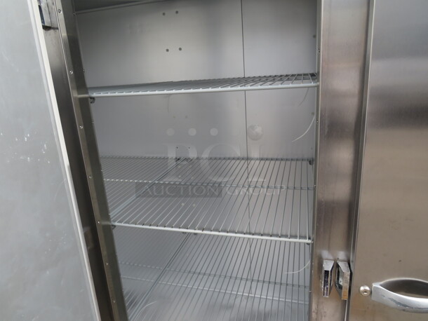One WORKING 3 Door Traulsen Refrigerator With 9 Racks On Casters.  115 Volt. Model# G30011. $9176.00. 76X34X83.5 - Image 4 of 5