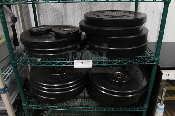 ALL ONE MONEY! Lot of 21 Various Rogue Bumper Plates; Eight 25 Pound, Nine 10 Pound and Four Five Pound. 