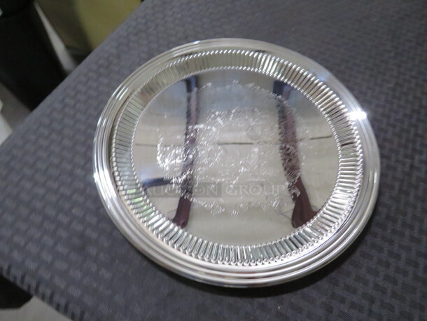 One NEW Vollrath 12 Inch Round Fluted  Serving Tray. #82168 - Image 1 of 1