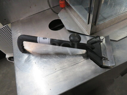 One Griddle Scrapper.