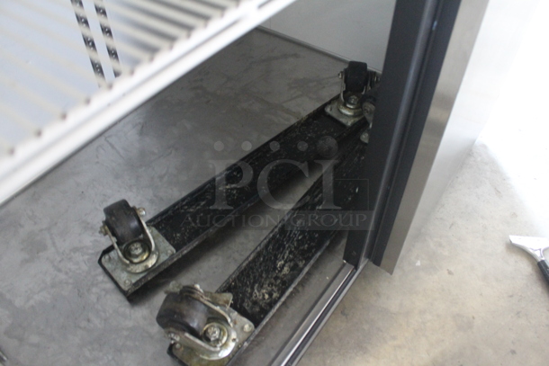 2013 True TG2R-2S Commercial Stainless Steel 2 Solid Door Reach-In Cooler With Plycoated Shelves And Commercial Casters. 115V, 1 Phase. Tested and Working! - Image 6 of 7