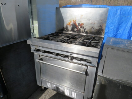 One Sunfire 6 Burner Gas Range On Casters. No Burners. 36X33X55