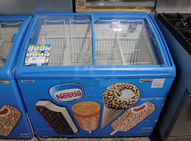 AHT RIO S 100 Metal Commercial Novelty Ice Cream Treat Freezer Merchandiser w/ Poly Baskets on Commercial Casters. 110-120 Volts, 1 Phase. - Item #1099605