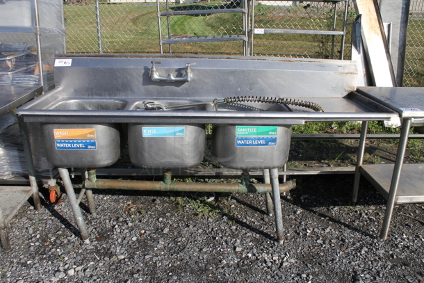 Stainless Steel Commercial 3 Bay Sink w/ Right Side Drain Board, Handles and Spray Nozzle Attachment.  - Image 1 of 3