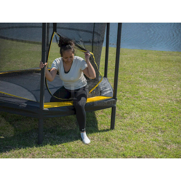 JumpKing 7.5-Foot Trampoline, with Enclosure, Black/Yellow. Jump King 7.5ft Trampoline & Enclosure System:

Enlarged door for easy entry
Patented over-under springs arrangements provide a better bounce
Unique shape and size for Indoor & Outdoor use
Can be enjoyed by either an adult or a child
User max weight: 180 lbs.
Heavy duty netting for added safety
Meets ASTM requirements                                      7-1/2ft w x 7-1/2ft d x 6.2ft h  - Image 6 of 11
