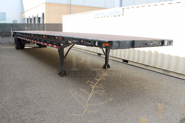 ROAD READY!! 40FT Steel Flatbed Tailer, 4 Wheels. 40FTx96".    VIN# 070F1283; Year 1970; Manufacturer Pike Trailer; Type Flatbed; Steel Construction; Length x Width 40' x 96"; Spring Ride Suspension; Location Single Fixed Axle; Tire Size LP 22.5; Wheel Construction Steel; Wheel Type Budd - Image 8 of 10