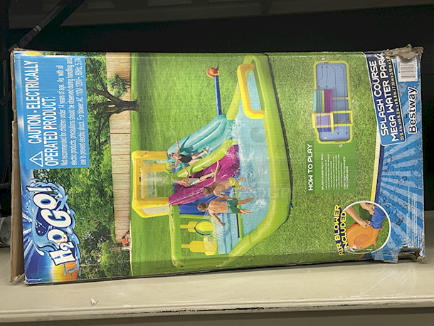 H2O GO Inflatable Water Park With Water Slide – Over 23ft Long. Contains: 01 SLIDE; 01 BLOWER (STAKES INCLUDED); 01 REPAIR KIT (MULTIPLE ASSORTED PATCHES); 1 STORAGE BAG; 10 BOUNCER STAKES; 1 PUC BALL SPRINKLER; 06 SMALL FLAGS; 01 WATER SPRAYING HOSE. Overall: 23ft – 4in x 10ft – 2in x 8ft – 8in.  - Image 8 of 9