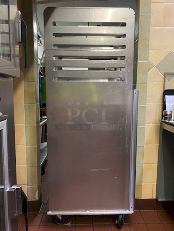 AMAZING! Lockwood CA72-RR12-6 Combination Open Air and Storage Display Cabinet With Removable Pan Support. 

9/10 Condition!

A versatile choice for cooling, storage and display with sheet pans
Construction: high tensile aluminum
Dimensions: 71-3/4"H x 22-7/8"W x 29-3/8"D
Center spacing: 3-1/4"
Pan capacity: supports (18) 18" wide pans (6 open air and 12 enclosed)
Casters: 5" non-marking swivel plate (2 with brakes)
Actual Weight: 120 lbs. - Image 7 of 8