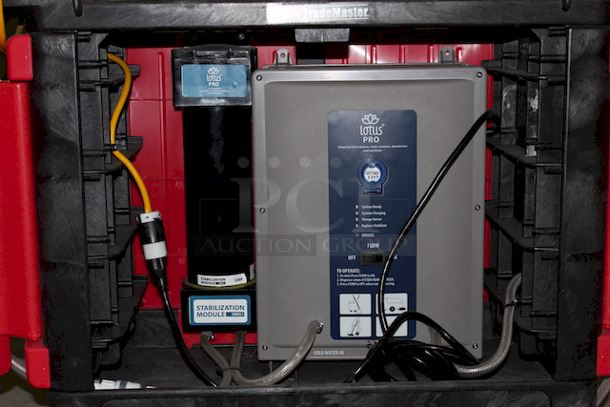 Mobile Sanitization Station. Features a LOTUS PRO Stabilized Aqueous Ozone (SAO3) High Capacity, chemical-free, sanitizing and cleaning Module Attached to a Rubbermaid Industrail Work Cart. This system transforms ordinary tap water into Stabilized Aqueous Ozone (SAO3) which is a powerful and natural surface sanitizer (99.999%), surface cleaner, stain remover, and deodorizer.

 - Image 7 of 8