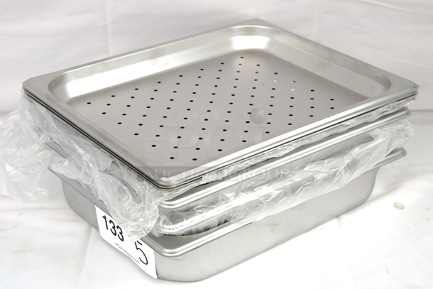 NEW/NEVER USED! (3) Vigor 1/2 Size 2 1/2" Deep Anti-Jam Stainless Steel Steam Table / Hotel Pan - 22 Gauge & (4) 1/2 Size 2 1/2" Deep Anti-Jam Perforated Stainless Steel Steam Table / Hotel Pan - 22 Gauge. 7x Your Bid  - Image 1 of 9