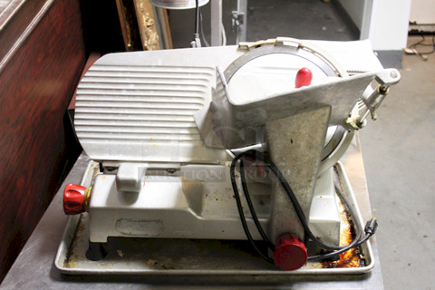 Berkel 827A 12" Manual Gravity Feed Meat Slicer - 1/2 hp, 4 Amps/60 Hz/1 Ph/115 V/460 W, 
24 Inches x 21 1/2 Inches x 21 1/4 Inches