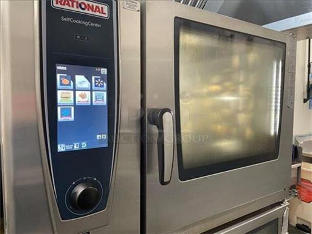 2 2016 Rational Stainless Steel Commercial Combitherm Self Cooking Center Convection Ovens on Commercial Casters. Top Model: SCC WE 62. Bottom Model: SCC WE 102. Picture of Unit Powered on is Included. 480 Volts, 3 Phase. 42x42x73. 2 Times Your Bid! - Image 11 of 11
