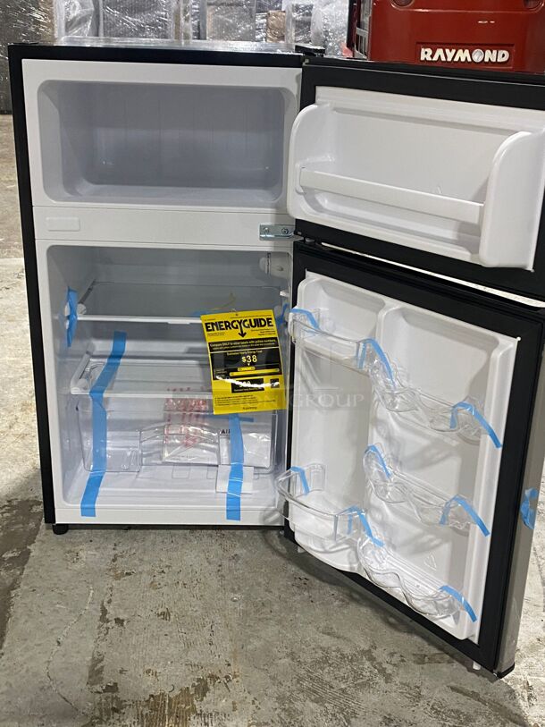 Brand New Scratch & Dent 18 Inch Compact Refrigerator with 3.1 Cu. Ft. Capacity, Can Holders, Full Width Freezer, Interior Light, Clear Crisper Drawer, Tall Bottle Storage, Reversible Door, and Energy Star Rated

MAKE: FRIGIDAIRE MODEL: FFPE4533UM WIDTH: 22 DEPTH: 23 HEIGHT: 33 ORIGINAL PRICE: $362.10 - Image 6 of 6