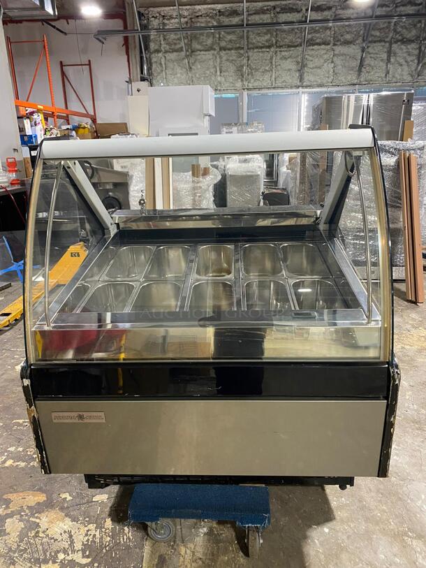 The Hydra-Kool KFM-GL-40-S Gelato/Ice cream Case is a versatile product designed with service type in mind, measuring 40-3/8"W x 43-3/8"D x 48-7/8"H. It has a large capacity of (10) pans ... - Image 1 of 5