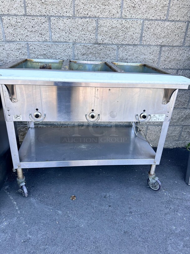 Late Model Duke E303 44 inch Hot Food Table w/ (3) Wells & Cutting Board, On Casters 115v/1ph Working  - Image 2 of 6