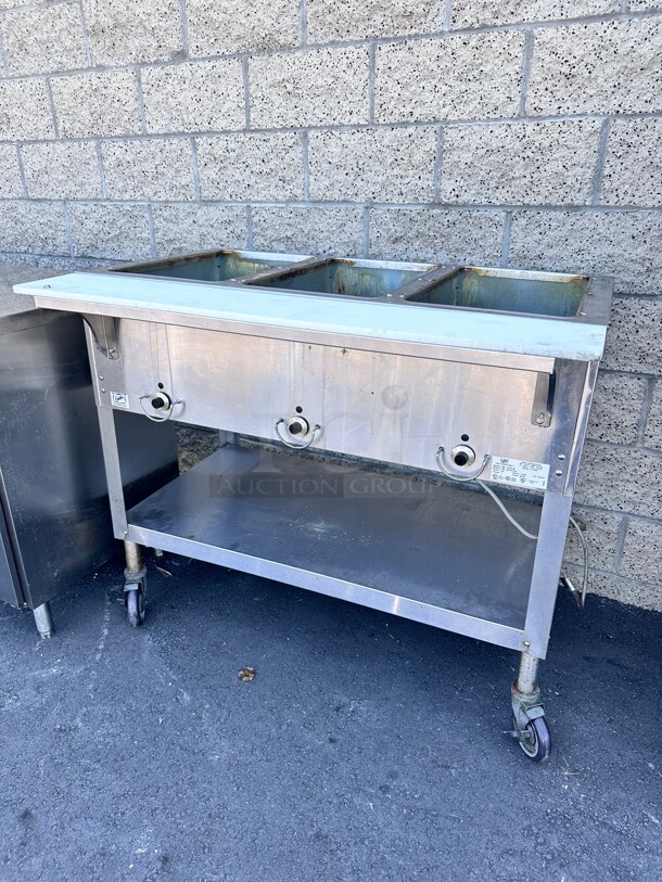 Late Model Duke E303 44 inch Hot Food Table w/ (3) Wells & Cutting Board, On Casters 115v/1ph Working  - Image 6 of 6
